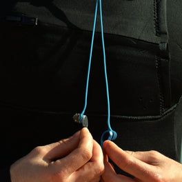 SEAR Plugs worn on the neck leash before a session