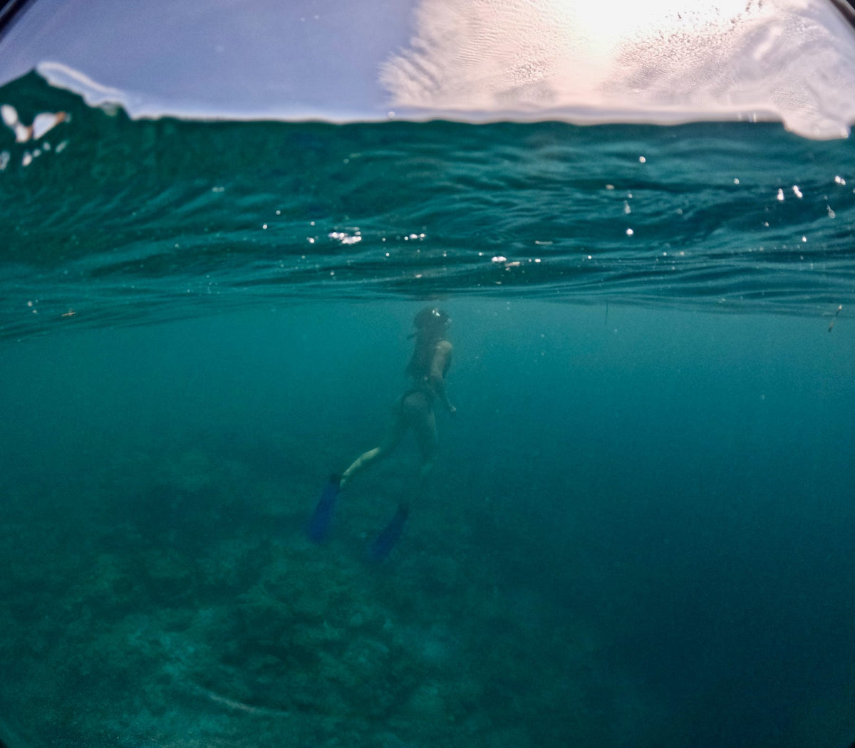 Kayaker paddling through whitewater