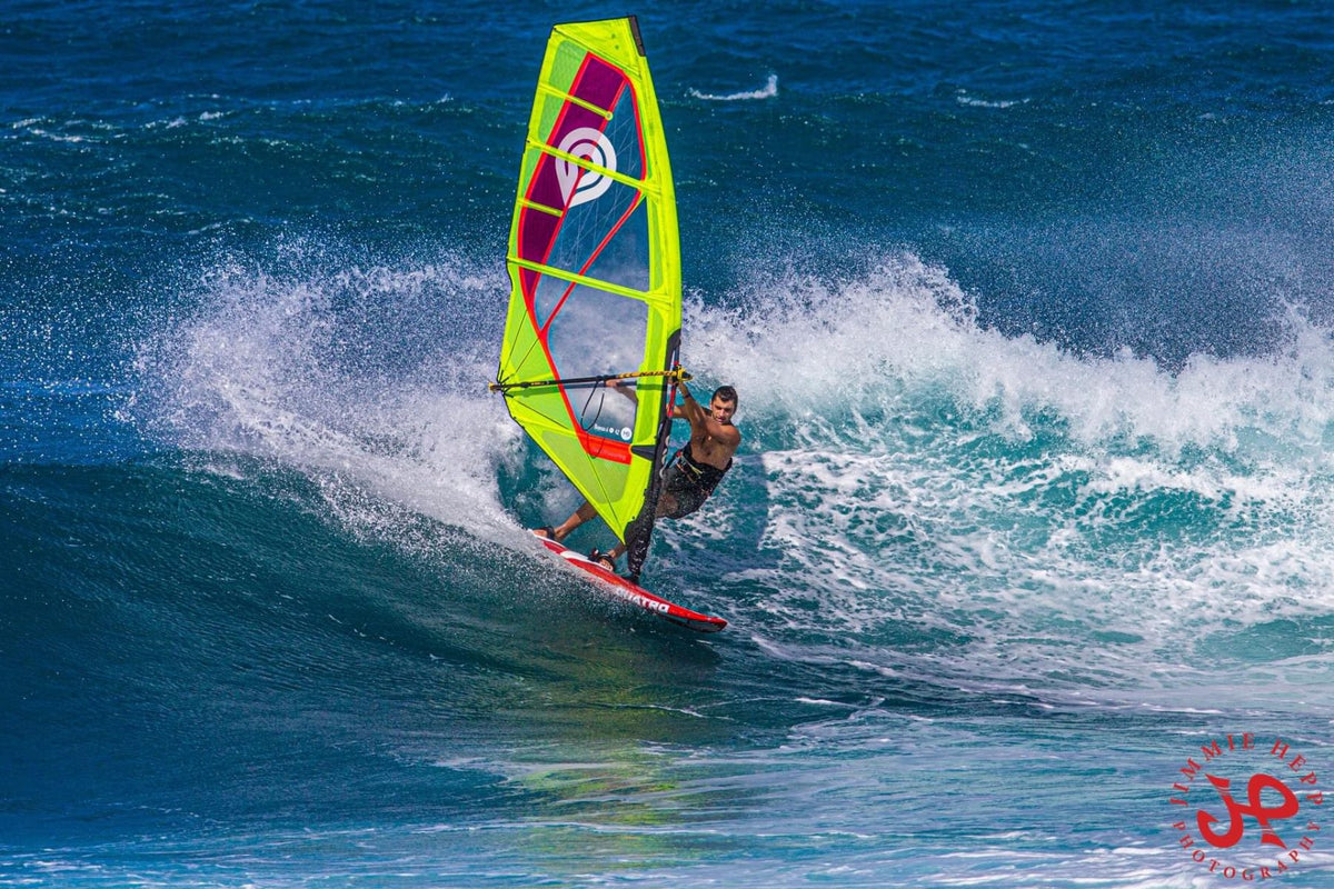 Kitesurfer jumping above the water
